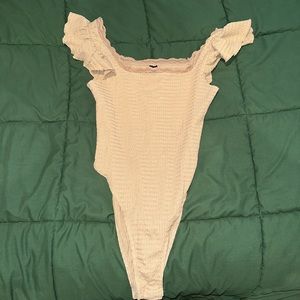 Body suit with flowy shoulders